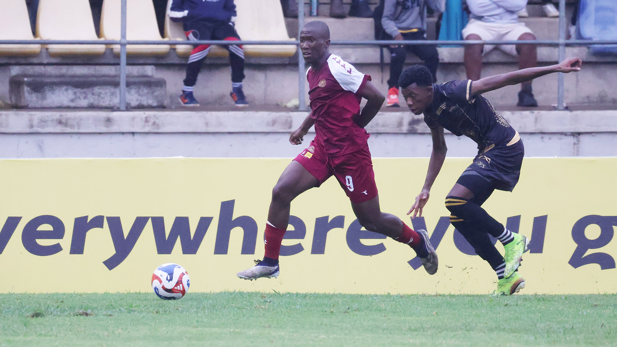 Manzini Wanderers’ Siyabonga Xaba dashing away with the ball from Mbabane Highlanders’ Bongumezi ‘King Dazza’ Khumalo during their MTN Premier League game at Mavuso Sports Centre this past weekend.